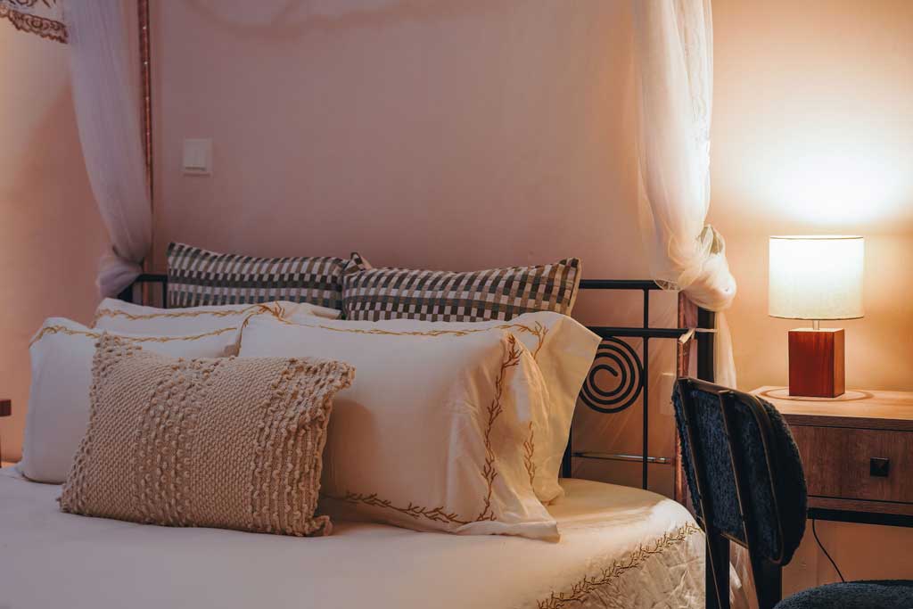 Double Rooms with Soft linens and curated pillows